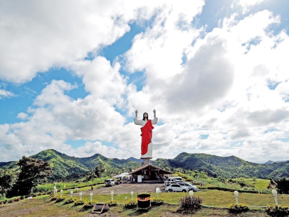  A 132-foot statue of the Sacred Heart of Jesus watches over capital Roxas City, where the “Aswang Festival” was also born.
